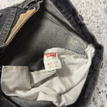 1990s Levi’s 550 Orange Tab Faded Black Denim Jeans