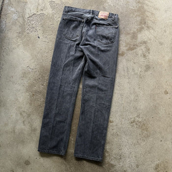 1990s LEVI’S 501 FADED BLACK DENIM JEANS MADE IN USA