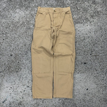 Pantalones de carpintero Carhartt WIP color tostado con doble rodilla