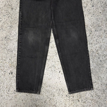 Vaqueros Levi's 560 de corte holgado y cónico en negro descolorido, años 90