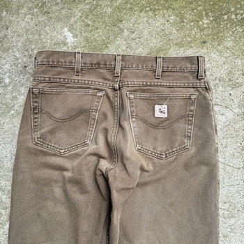 1990s CARHARTT FADED THRASHED GREEN DENIM JEANS