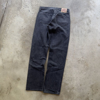 1990s LEVI’S 501 BLACK FADED DENIM JEANS MADE IN USA