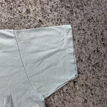 Camiseta de bolsillo de Fórmula 1 descolorida de los años 80