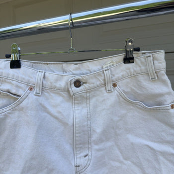 1990s Levi's 550 Orange Tab White Denim Shorts