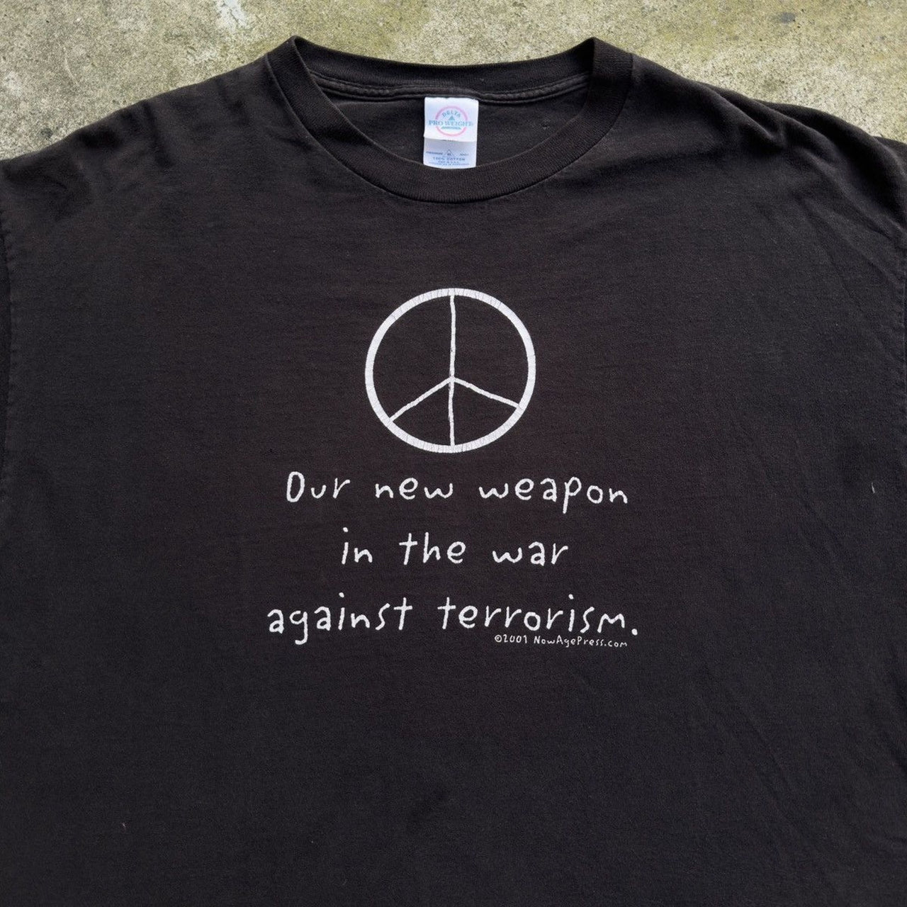 2000S OUR NEW WEAPON IS THE WAR AGAINST TERROISM PEACE TEE