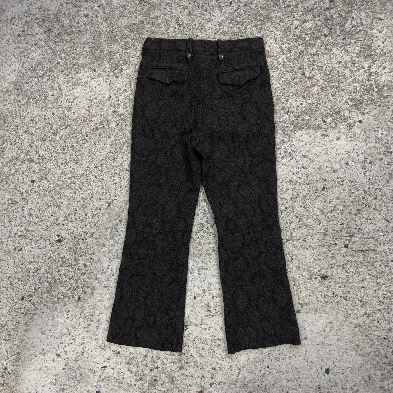 Pantalones acampanados con estampado de piel de serpiente de lana de Dries Van Noten