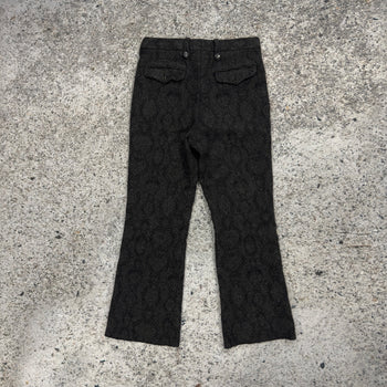 Pantalones acampanados con estampado de piel de serpiente de lana de Dries Van Noten