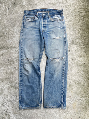 2000s THRASHED FADED LEVI’S 501XX DENIM JEANS