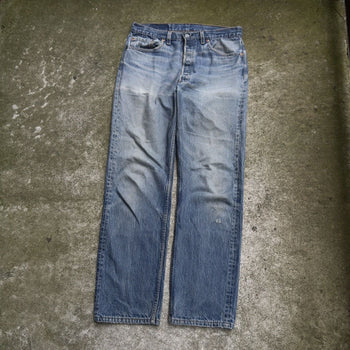 1990s LEVI'S 501XX MADE IN USA FADED THRASHED DENIM JEANS