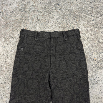 Pantalones acampanados con estampado de piel de serpiente de lana de Dries Van Noten