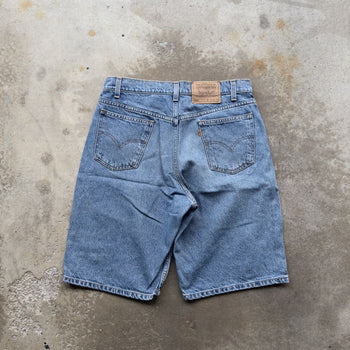 1990s LEVI’S 550 ORANGE TAB LIGHT WASH BAGGY DENIM JEAN SHORTS JORTS