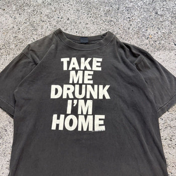 Camiseta descolorida "Llévame borracho, estoy en casa" de los años 90
