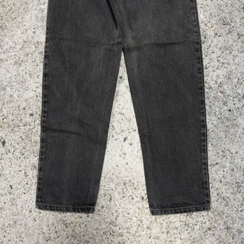 Vaqueros Levi's 550 negros descoloridos de la década de 1990