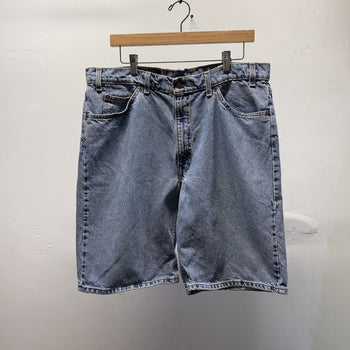 Vintage 1990s Levi's 550 Orange Tab Denim Shorts Grunge Faded