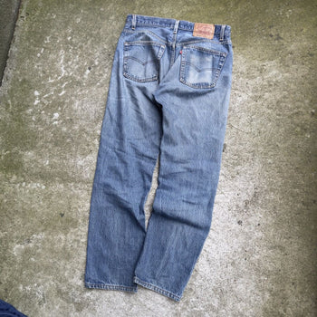 1990s LEVI'S 501XX MADE IN USA FADED THRASHED DENIM JEANS