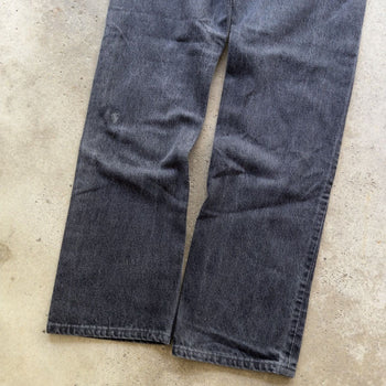 1990s LEVI’S 501 BLACK FADED DENIM JEANS MADE IN USA