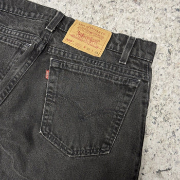 Vaqueros Levi's 560 de corte holgado y cónico en negro descolorido, años 90