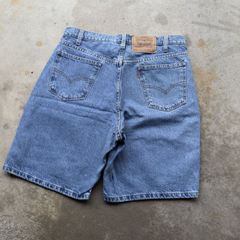 1990S LEVI’S 550 ORANGE TAB DENIM JEAN SHORTS JORTS