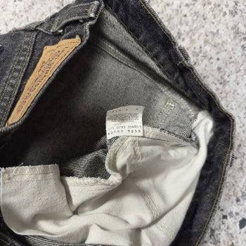 1990s Levi’s 550 Orange Tab Faded Black Denim Jeans