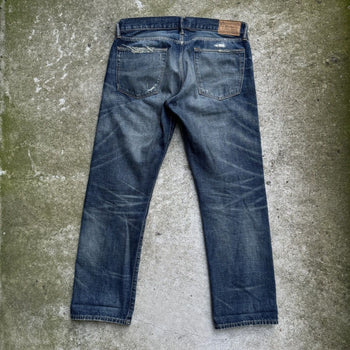 JEANS DE DENIM DESGASTADOS Y REPARADOS CON ORILLO DE POLO RALPH LAUREN