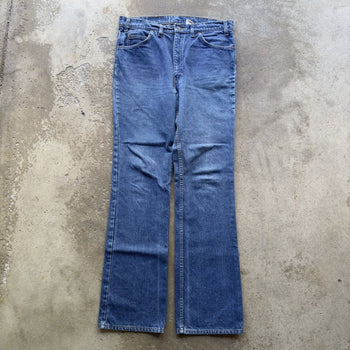 1990s LEVI'S 517 ORANGE TAB MADE IN USA BOOT CUT FADED DENIM JEANS