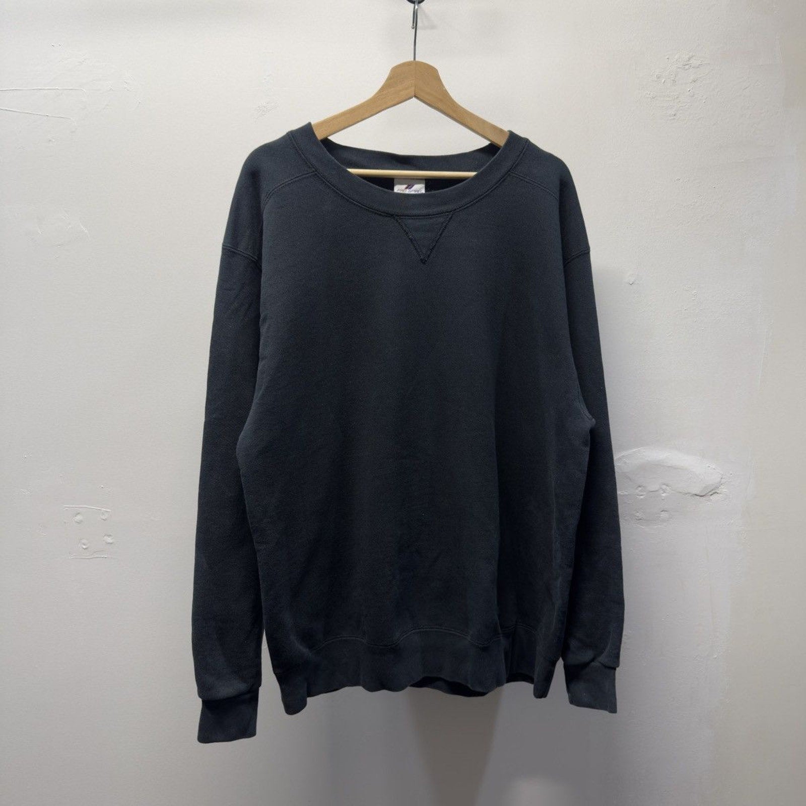 Vintage 1990s Made in USA Faded Black Blank Sweatshirt