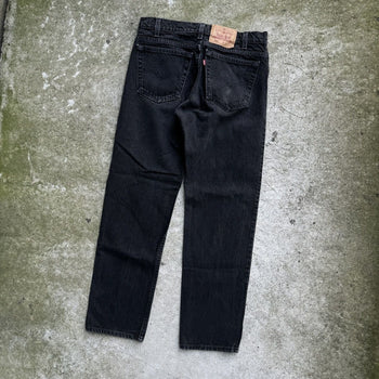 1990s LEVI'S 505 MADE IN USA BLACK FADED DENIM JEANS