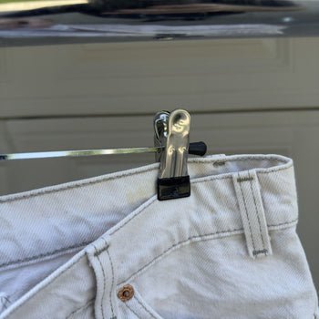 1990s Levi's 550 Orange Tab White Denim Shorts