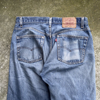 1990s LEVI'S 501XX MADE IN USA FADED THRASHED DENIM JEANS