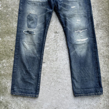 JEANS DE DENIM DESGASTADOS Y REPARADOS CON ORILLO DE POLO RALPH LAUREN