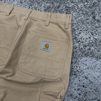 Pantalones de carpintero Carhartt WIP color tostado con doble rodilla