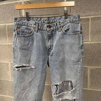 1990s Levi’s Thrashed Faded Distressed Flare Jeans
