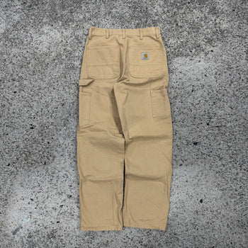 Pantalones de carpintero Carhartt WIP color tostado con doble rodilla