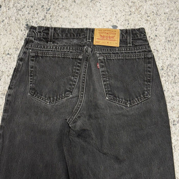 Vaqueros Levi's 560 de corte holgado y cónico en negro descolorido, años 90