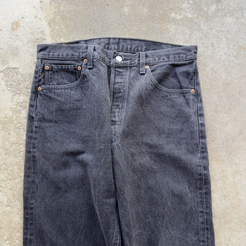 1990s LEVI’S 501 BLACK FADED DENIM JEANS MADE IN USA