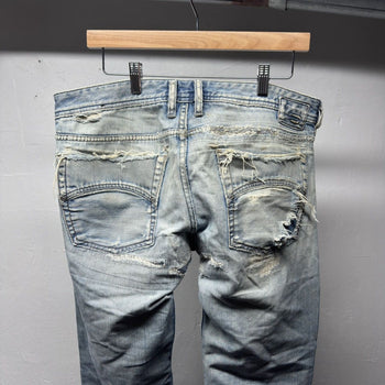 Diesel Thrashed Faded Distressed Repaired Jeans
