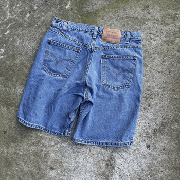 1990s LEVI'S 550 FADED LIGHT WASH DENIM SHORTS WHITE TAB