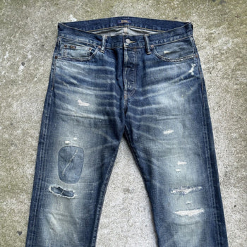 JEANS DE DENIM DESGASTADOS Y REPARADOS CON ORILLO DE POLO RALPH LAUREN