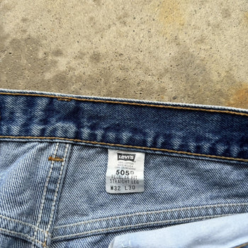 1990S LEVI’S 505 MADE IN USA FADED STRAIGHT LEG DENIM JEANS